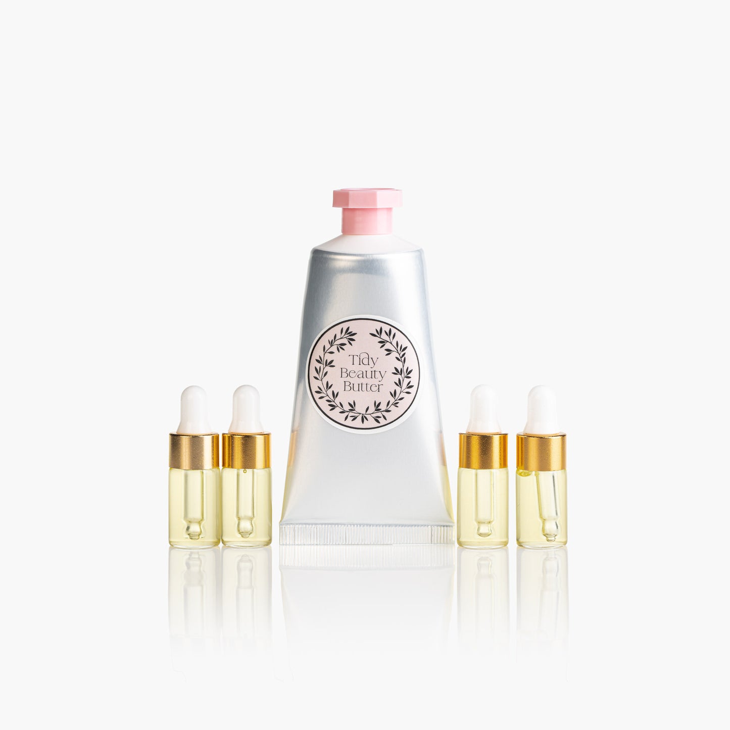 Tidy Beauty Korean skincare travel mini set with body butter and oil droppers on white background