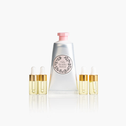 Tidy Beauty Korean skincare travel mini set with body butter and oil droppers on white background