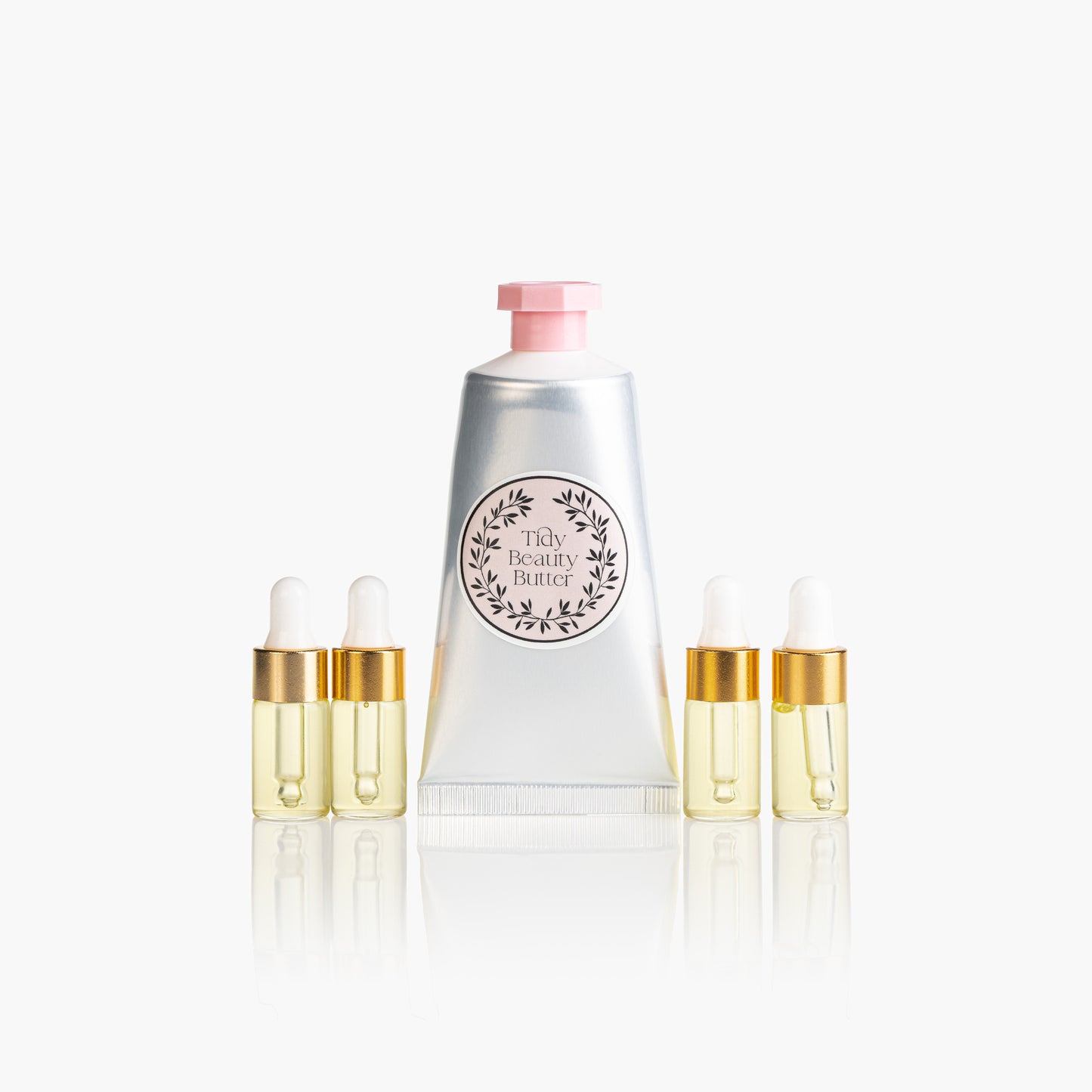 Tidy Beauty Korean skincare travel mini set with body butter and oil droppers on white background
